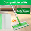 A green Swiffer Sweeper floor mop with a white pad and a green handle, shown next to a box.