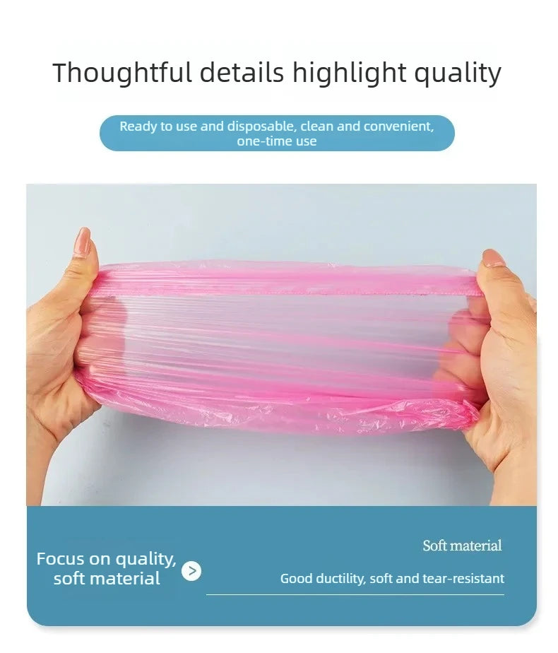 Hands hold a pink, thin plastic film or shower cap, highlighting its soft and durable material.
