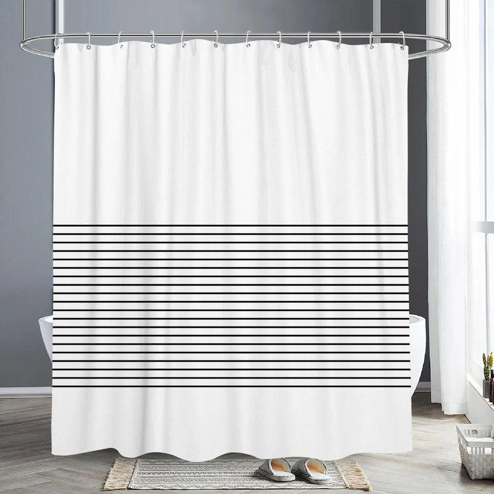 White shower curtain with horizontal black lines and a metal rod hanging in a bathroom setting.