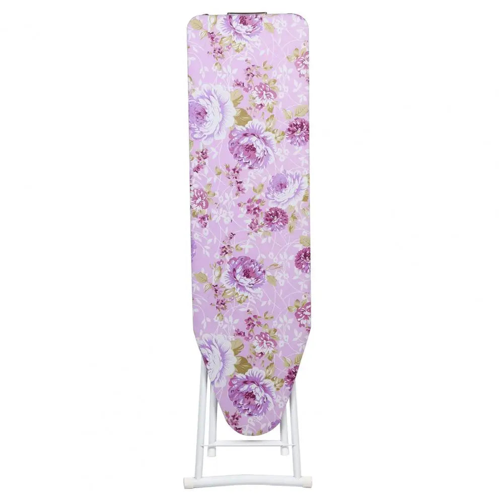 Tabla de planchar con estampado floral morado y soporte blanco.