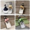 A set of anti-splash faucet extenders with a cute rabbit design in various colors and finishes.