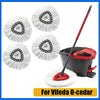 A white microfiber replacement mop head with a black and white patterned insert and a red handle for Vileda O-cedar mop.
