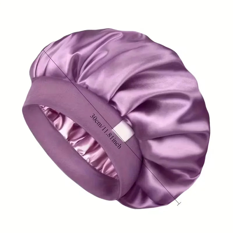 Bonete de pelo satinado morado visto desde arriba, destacando la textura de la tela y las marcas de medida.