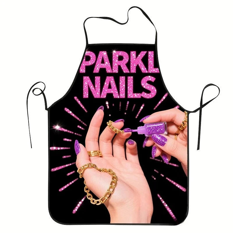 A hand is shown holding a pink sparkly nail artist apron with a starburst design.