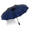 A dark blue fully automatic double-layer outdoor umbrella open and angled against a white background.