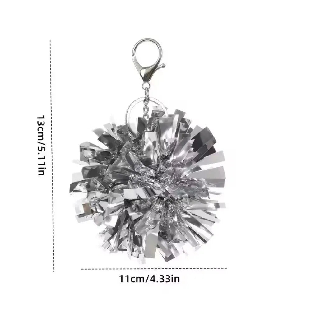 Silberner Pom-Pom-Anhänger mit silberner Ring und stacheligen, reflektierenden metallischen Akzenten