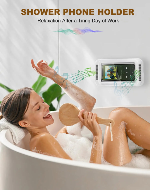 A woman is relaxing in a bathtub while using a shower phone holder to listen to music.