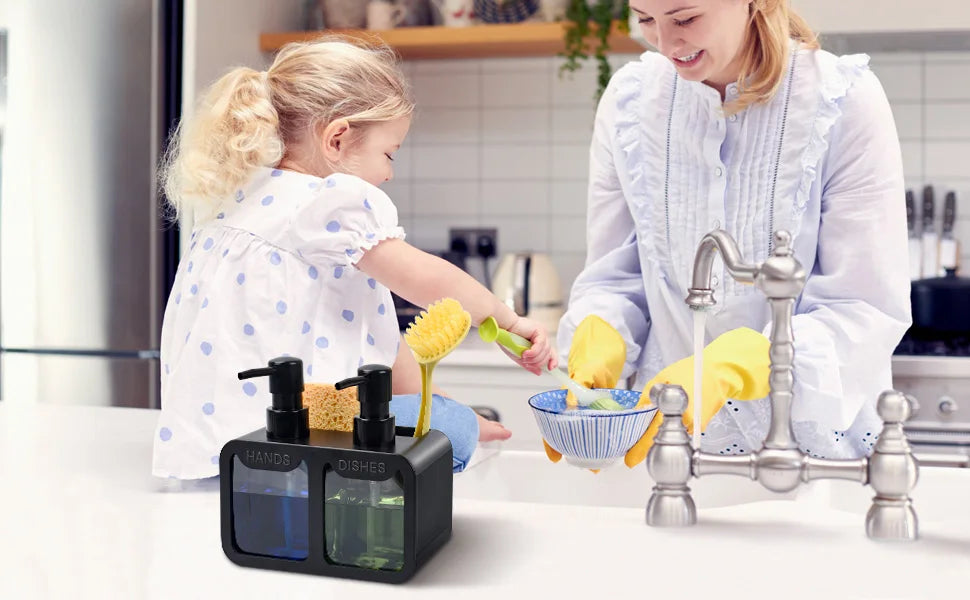 A woman and a child are using a black 3-in-1 kitchen soap dispenser set for dishwashing.