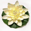 A light yellow artificial lotus flower with green leaves, used for pond and garden decor.