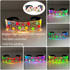 A pair of bright, colorful LED light-up anime glasses with a hexagonal pattern, shown in various colors and packaging.