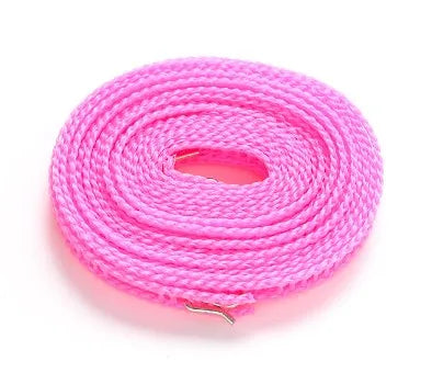 Pink portable windproof clothes drying line coiled on a white background