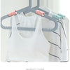 A set of gray and white finishing clips used to organize wires, headphones, and data cables on a clothes hanger.