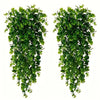 Two vertical garlands of artificial green leaves used for home decor