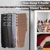 A stainless steel hanger rack displaying five pairs of pants hanging to maximize closet space.