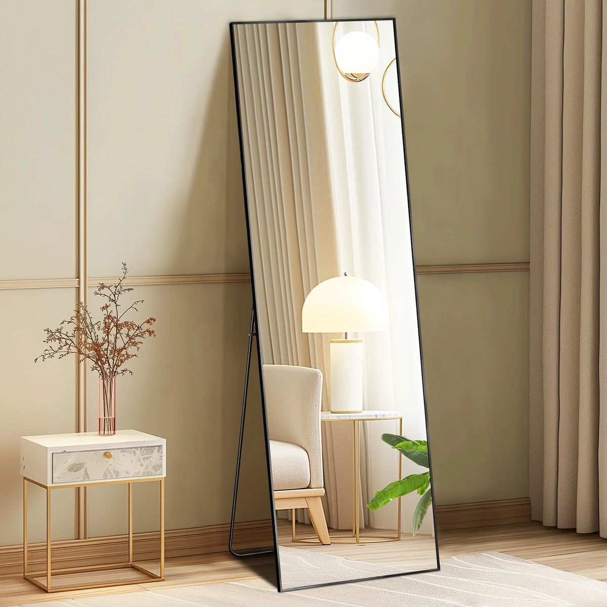 A full body standing wall mirror with a vertical ribbed frame reflecting a light fixture and a lamp.