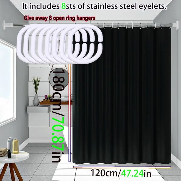 A pure black decorative shower curtain hanging in a bathroom setting.