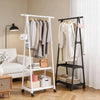 A white adjustable metal coat rack with hangers displaying various coats and bags in a bright room.