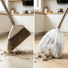 A close-up view of a disposable electrostatic broom cover being used to quickly clean dust from a wooden floor.