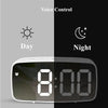 A digital alarm clock displaying 8:00 with a sun icon for day mode and a moon icon for night mode.