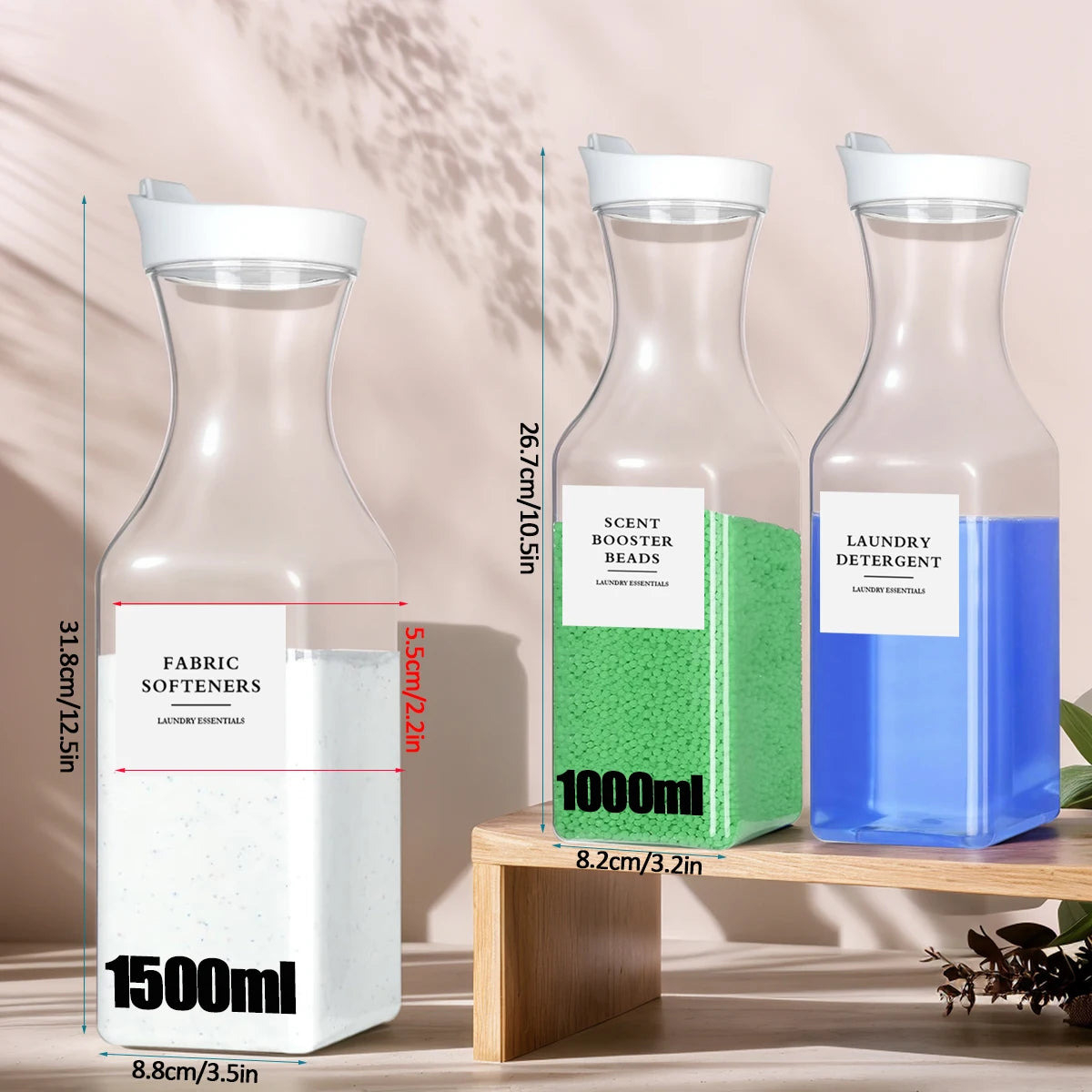 Three refillable glass bottles of laundry detergent with white caps and green and blue liquid inside