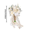 Elegant artificial rose wedding bouquet featuring white roses and dried floral accents