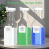 Three clear glass storage bottles with white and green granular laundry detergent refills