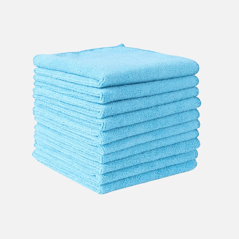 A stack of light blue thickened microfiber cleaning cloths for glass and surfaces.