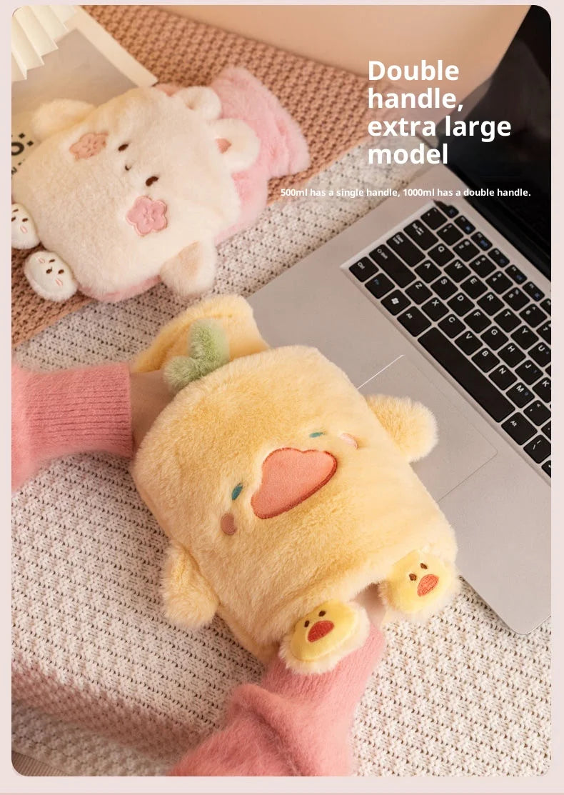 A yellow plush animal hot water bottle with a pink sleeve is shown next to a laptop.