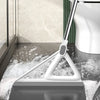 A white silicone window and surface cleaner is shown cleaning a glass surface on a countertop.