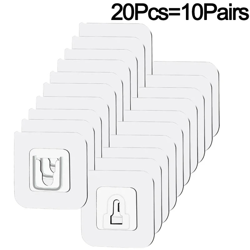 A pack of white invisible double-sided adhesive wall hooks, showing various hook shapes.