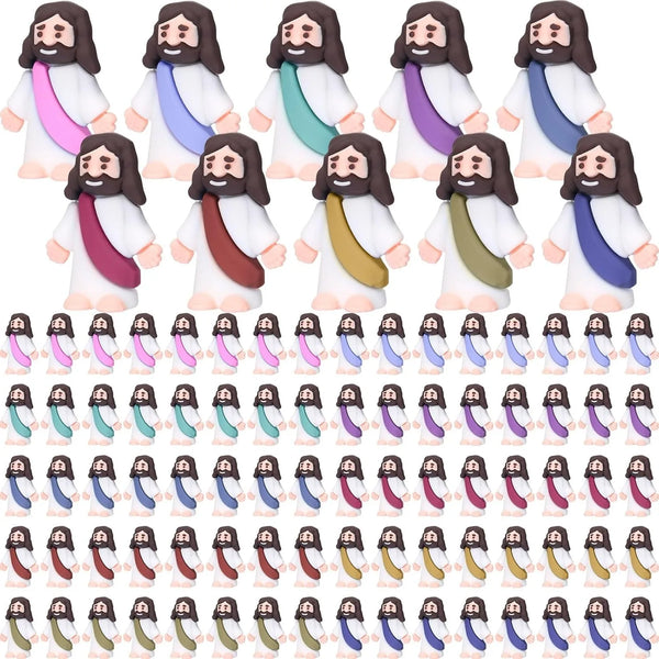 A collection of mini Jesus figurines in various colors and outfits for Easter and religious decor.