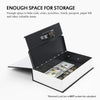 A black lock box with an open lid displaying a stack of cash and various valuables inside.
