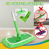 A green reusable microfiber swiffer mop with a handle and a green cleaning pad is shown on a wooden floor.