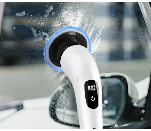 Un limpiador eléctrico blanco con cepillo azul está limpiando una superficie de ventana.
