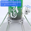 A green can dispenser with double springs is shown inside a metal tray, demonstrating its stability and smoothness.