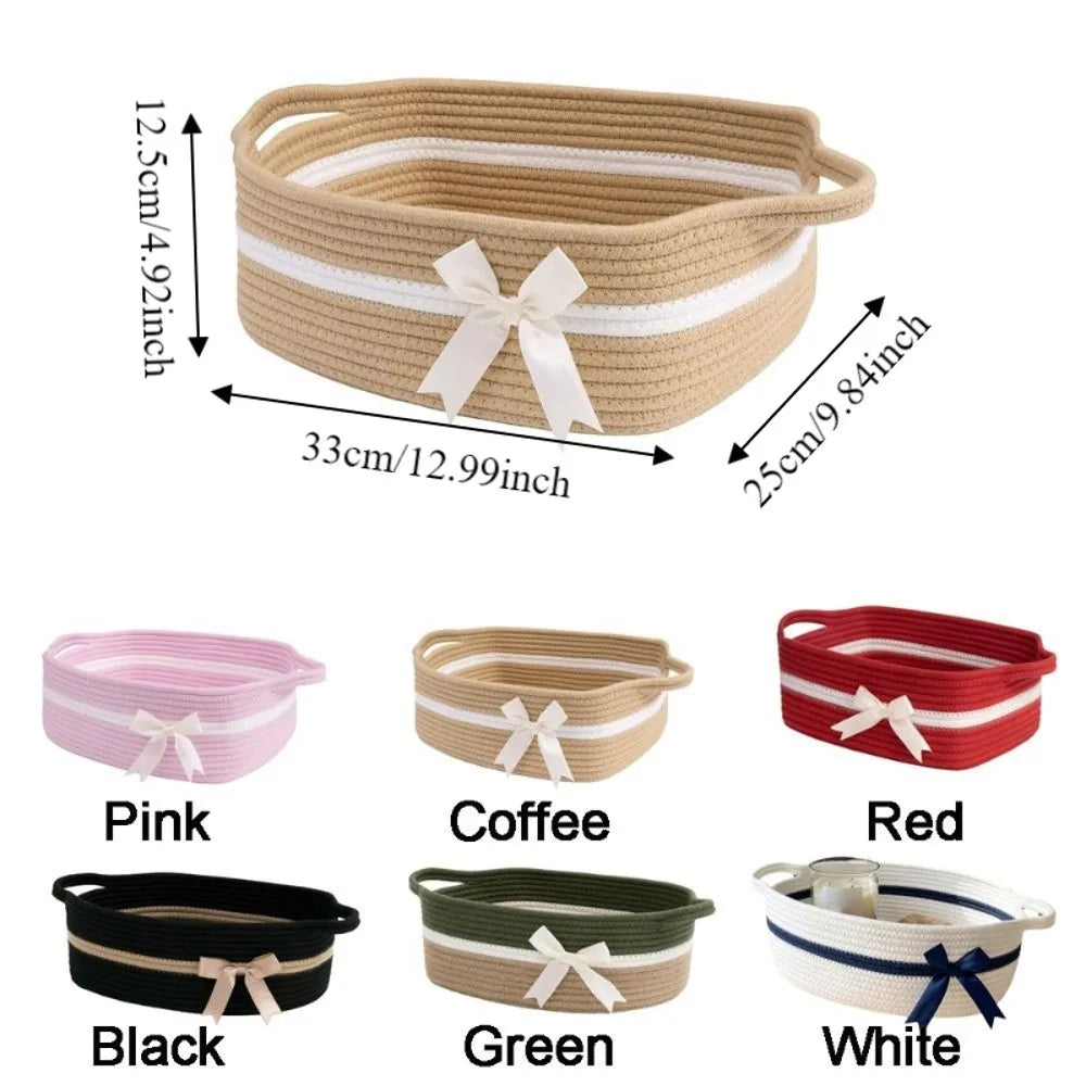 A collection of woven cotton rope storage baskets in various colors including pink, coffee, red, black, green, and white.