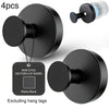Four matte black suction cup hooks shown in various views, including a close-up and a full product shot.