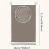 A rectangular beige fabric organizer with a circular cutout for hanging laundry, measuring 50cm wide by 73.5cm high.