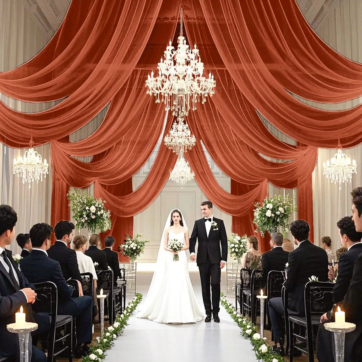 A wedding ceremony setup featuring a bride and groom standing on an aisle lined with white flowers and candles under draped o
