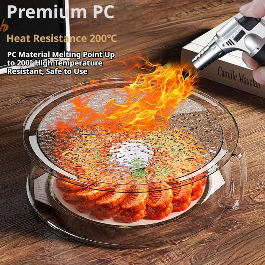 Clear microwave splatter guard with a heat-resistant handle shown over food being heated.