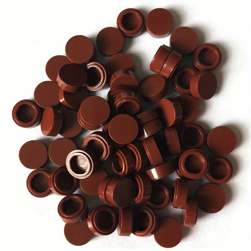 A collection of round, brown building blocks used for DIY projects.