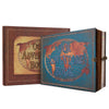 A brown leather-bound photo album with a blue cover featuring a globe design and the text Our Adventure Book