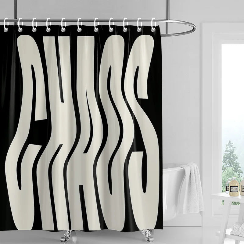 A black shower curtain featuring abstract geometric art in white and beige tones.