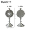 Two sides of a mini metal religious ornament featuring a cross and a circular design.