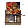 A musical tone box featuring an anime character design, packaged in a wooden box.