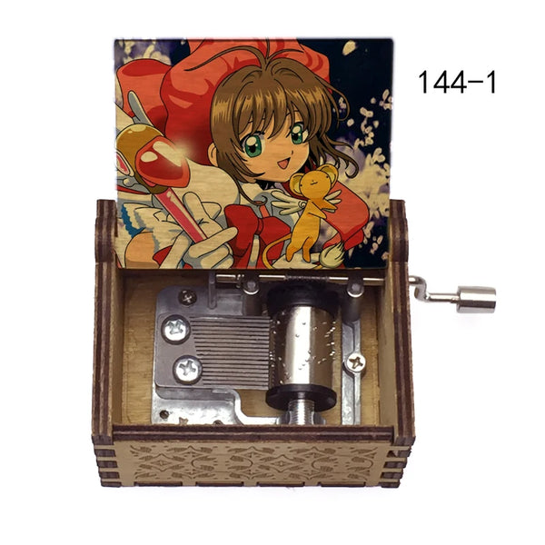 A musical tone box featuring an anime character design, packaged in a wooden box.