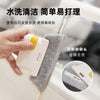 A hand is using a white cleaning brush to clean water stains from a window track or groove.