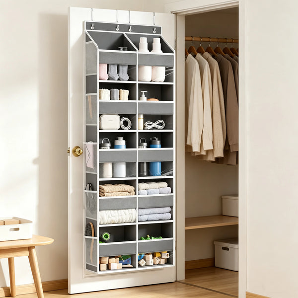 A white over-the-door hanging storage organizer with multiple compartments for household items.