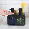 A black 3-in-1 kitchen soap dispenser set with two glass bottles and a yellow brush is shown next to a hand dispensing liquid