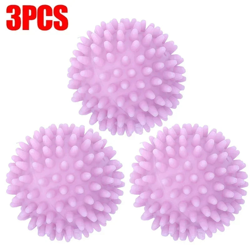 Three pink reusable silicone laundry balls